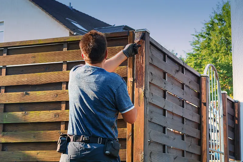 Dr. Paint fence painter at work in Palm Coast, FL