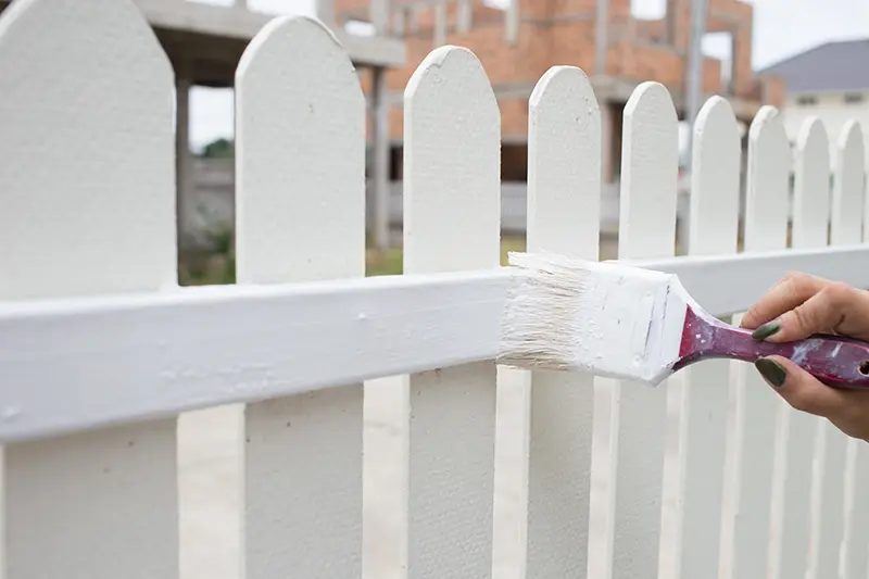 Freshly painted white fence