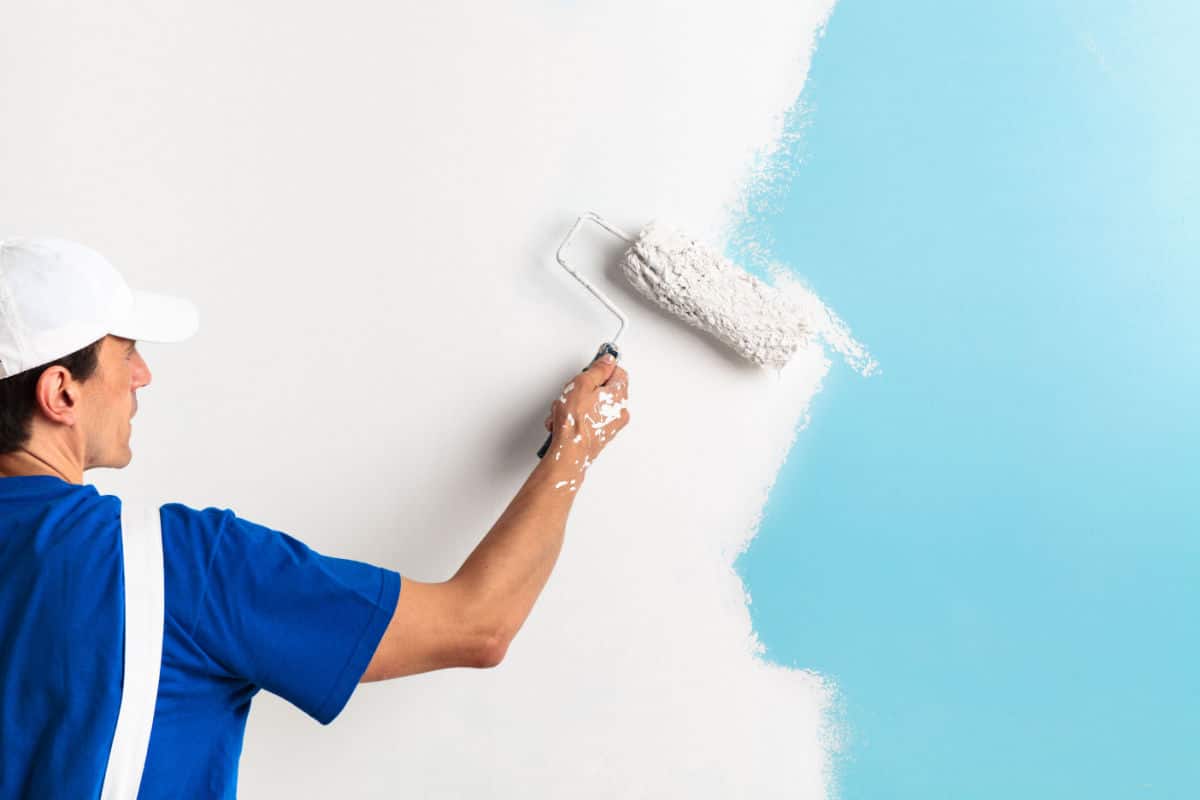 Dr. Paint professional applying a smooth finish